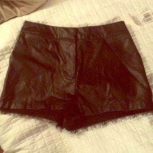 Black leather and lace shorts
